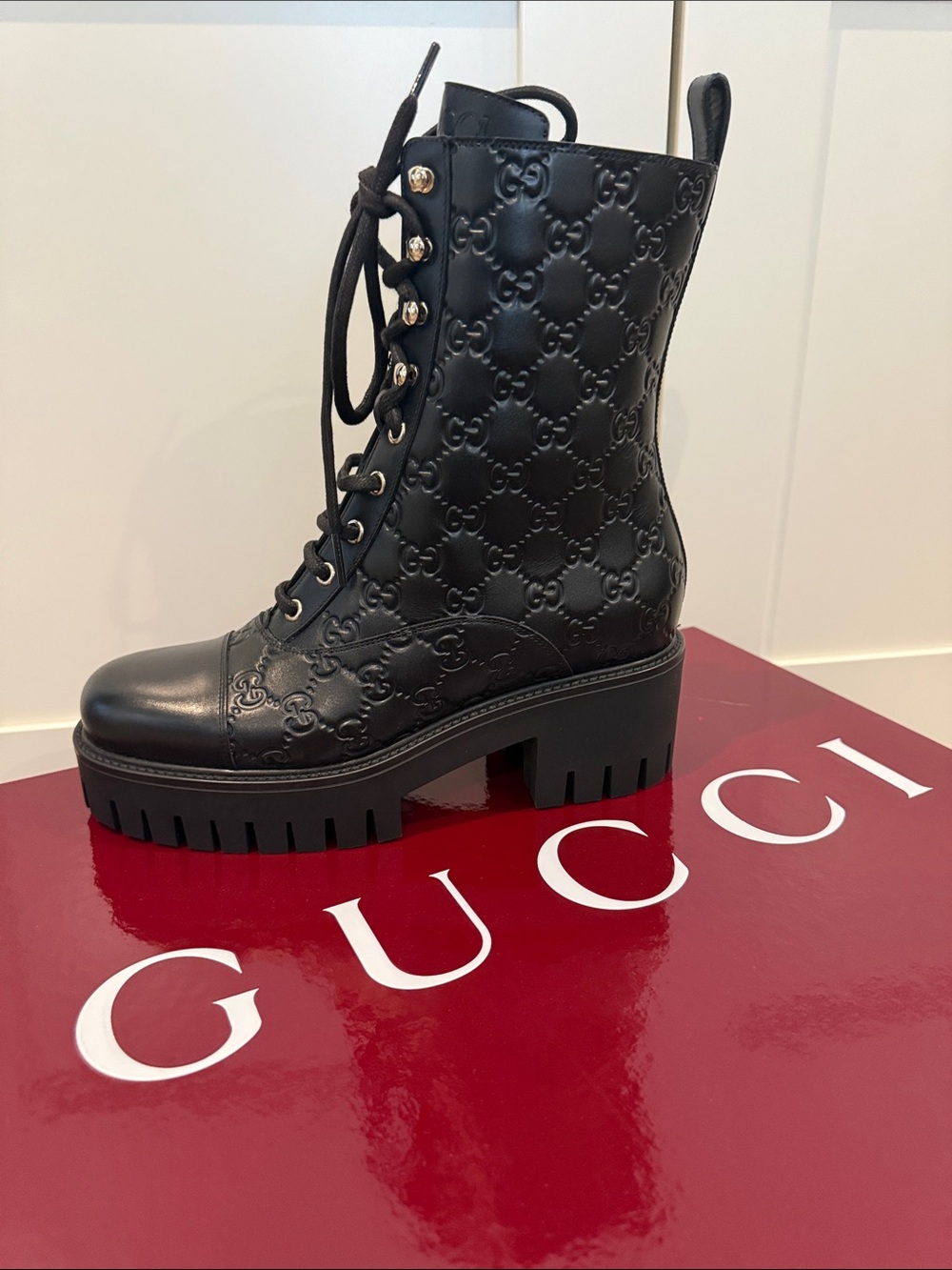 Gucci Black Embossed Leather Lace-Up Combat Boot
